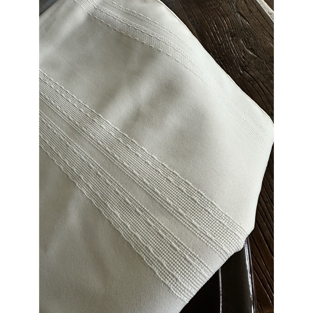 Large easy care polyester tablecloth 60" x 120" light cream with textured lines